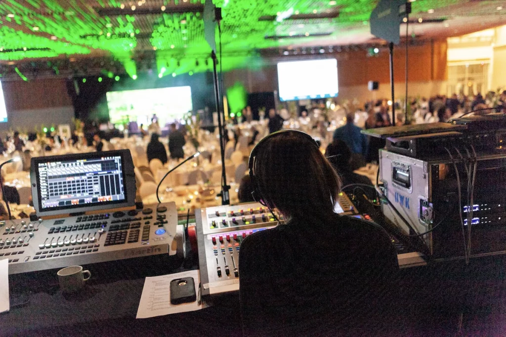 An event technician working at a large event.